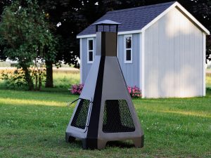 Picture of chiminea on lawn with garden shed in background